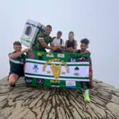 Tommy Dunford and supporters at the summit of Snowdon.