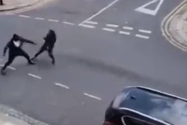 Two men seen fighting with Rambo knives on Cadoxton Avenue in Tottenham
