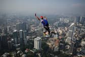 Mark Andrews had taken part in a base jumping event in Kuala Lumpur, Malaysia (Photo credit should read MANAN VATSYAYANA/AFP via Getty Images)